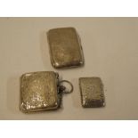 A small George V silver rectangular cigarette case with engraved decoration,