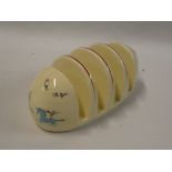 A Beswick pottery (circus) pattern four-section toast rack