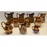 A collection of ten various 19th century copper lustre tapered jugs with varying designs