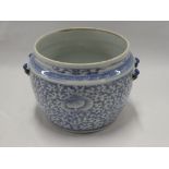 A 19th century Chinese circular bowl with blue and white floral decoration 8" diameter