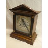 A German bracket clock with painted square dial in polished walnut and ebonised case