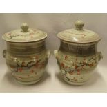 A pair of large Studio pottery two-handled jars and covers with painted floral decoration marked