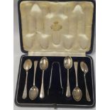 A set of six silver teaspoons with matching sugar tongs, Sheffield marks,