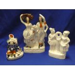 A Victorian Staffordshire pottery flat back figure of a male and female and two other various