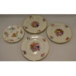 Three 19th century Derby china circular plates with painted floral decoration and one other floral