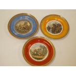 Three 19th century Prattware pottery circular plates with landscape and animal decoration
