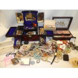 A large selection of various costume jewellery including dress rings, necklaces, brooches,