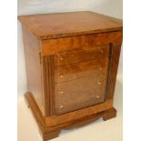 A high quality modern burr walnut jewellery cabinet with four small drawers enclosed by a bevelled