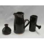 A Shoji Hamada St Ives studio pottery tapered jug with brown and black speckled glaze decoration,