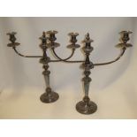 A pair of good quality silver-plated three branch adjustable candelabra on tapered stems and