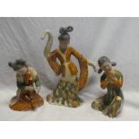 Three Eastern majolica-glazed figures of female dancers and musicians (af)