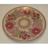 A Crown Ducal Rhead-style pottery circular platter with pink floral decoration,