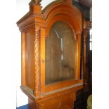 An old carved pine longcase clock case to fit a 12" arched dial