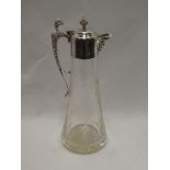 A good quality cut glass claret jug with electroplated hinged lid and handle