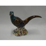 A small 19th century pottery figure of a pheasant 6" long