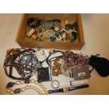 A large selection of various costume jewellery, ladies wristwatches, necklaces,