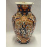 A 19th century Japanese Imari pottery tapered vase with painted floral and dragon decoration,