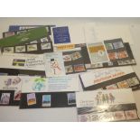 A selection of GB stamp presentation packs and covers