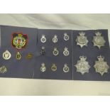 A collection of various Police badges and insignia including four helmet plates - Devon &