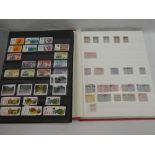 Two stock books containing a collection of New Zealand mint and used stamps