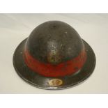A Second War painted Fire Service helmet "NFS 19" with chin-strap and liner