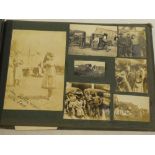 A First War era album of snapshots and photographs including numerous school photographs and