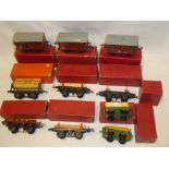 Hornby 00 gauge - ten various boxed wagons including timber wagon, flat truck,