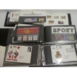 An album of GB stamp presentation packs, album of GB first day covers, mainly 1980's,