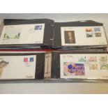 Two albums containing a collection of approximately 150 Abbey first day covers 1960-1980