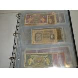 An album containing a collection of over 75 various military occupation banknotes and Armed Forces