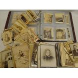 An album and box containing various Victorian carte de visites and cabinet photographs,