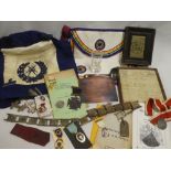 A selection of various Masonic regalia including silver 1893 enamelled medallion, various aprons,