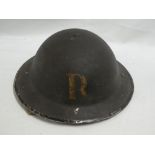 A Second War Home Service steel helmet with "R" emblem for rescue