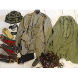 A selection of military stable belts, aguilettes, military shirt, jacket etc.