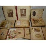 Five Victorian photograph albums containing a selection of over 200 various carte de visites and