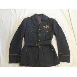A RAF Pilot's double-breasted tunic with brass King's Crown buttons,