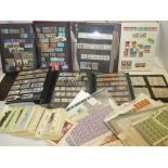 Various albums and stock books containing a selection of GB stamps,