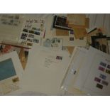 A box containing various postcards, stamps, small stock book of GB stamps, covers etc.