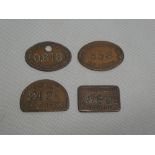 Four Great Western Railway copper pay cheques including "GWR Loco and Carr Department etc.