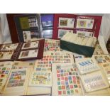 Twelve albums/stock books containing a selection of mixed World stamps together with PHQ cards,