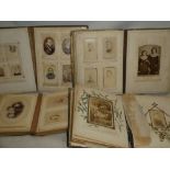 Four Victorian leather photograph albums containing a selection of over 200 various carte de