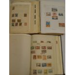 Three folder albums containing a collection of British Commonwealth stamps including Labuan and