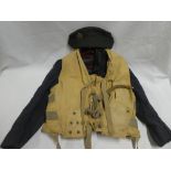A Second War RAF Air-Gunner's tunic with 1945 dated life jacket and RAF side hat