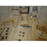 Two albums containing a collection of Middle East stamps,