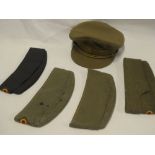 A Belgian Army Logistics Corps khaki peaked cap with brass badge and four various German post-War