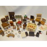 A large selection of vintage doll's house furniture and effects