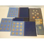 A folder containing a collection of British silver and cupro-nickel half crowns 1941-1958;