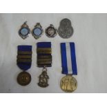 A selection of various shooting medals including Royal Navy Rifle Shooting 1960's medal,