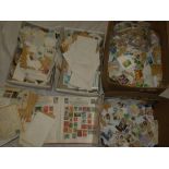 Various albums of World stamps together with numerous GB and World stamps on/off paper etc.