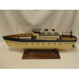 An old wooden scale built model steam driven boat with brass steam engine 33" long